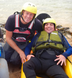 Chief Instructor with a client in a kayak